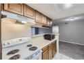 Cozy kitchen offering a view into the dining area at 18193 E Kentucky Ave # 204, Aurora, CO 80017