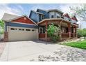 This lovely home includes a large two car garage, a large driveway, and a cozy front porch at 900 Wilshire Dr, Berthoud, CO 80513