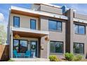 Exterior of a modern brick home featuring manicured landscaping, modern windows, and a covered porch for outdoor enjoyment at 2004 S Galapago St, Denver, CO 80223