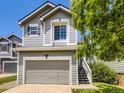 Inviting two-story home boasts a two-car garage and traditional architecture at 4287 Brookwood Pl, Highlands Ranch, CO 80130
