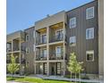 Modern condo building featuring balconies, clean lines, and neutral tones at 3880 W 13Th Ave, Denver, CO 80204