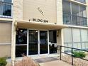 Apartment entrance, showcasing secure access and building number at 3124 S Wheeling Way # 102, Aurora, CO 80014
