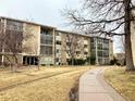 Apartment exterior showcasing well-maintained landscaping and common areas at 3124 S Wheeling Way # 102, Aurora, CO 80014