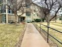 Exterior walkway leading to an apartment building entrance at 3124 S Wheeling Way # 102, Aurora, CO 80014