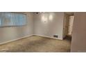 This bedroom features neutral walls and carpet flooring at 12170 Huron St # 106, Denver, CO 80234