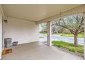 Spacious covered front porch with views of the street and neighborhood playground at 12507 Dexter Way, Thornton, CO 80241