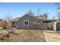 Charming single story home with covered carport and cozy front yard at 755 Newark St, Aurora, CO 80010