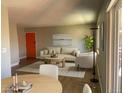 Cozy living room featuring neutral tones, a plush sofa, and a minimalist coffee table at 1415 Bacchus Dr # D9, Lafayette, CO 80026