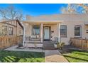 Updated craftsman bungalow with light teal door at 3403 N Raleigh St, Denver, CO 80212