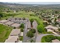 Stunning aerial view of the community, showcasing the surrounding landscape and neighborhood at 6948 Buckskin Dr, Littleton, CO 80125