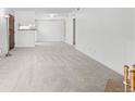 The wide-open living space is filled with sunlight and has plush neutral carpeting throughout at 1758 S Pitkin Cir # A, Aurora, CO 80017