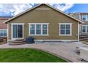 Private backyard featuring a stamped concrete patio, perfect for outdoor entertaining and relaxation at 22820 E Chenango Ave, Aurora, CO 80015