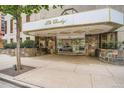 Elegant building entrance with stone accents, recessed lighting, and a welcoming glass entryway for pedestrian access at 1625 Larimer St # 1104, Denver, CO 80202