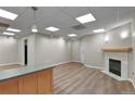 Living room with hardwood floors and fireplace at 3872 S Dallas St # 7-101, Aurora, CO 80014