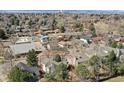 Neighborhood aerial shot showcasing the property's location with views of Denver skyline and surrounding homes at 270 S Locust St, Denver, CO 80224