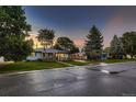 Updated ranch home on a quiet street with a spacious front yard at 4995 E Atlantic Pl, Denver, CO 80222