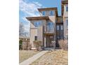 Attractive three-story home with modern design, balcony and appealing front facade at 2053 Meade St, Denver, CO 80211