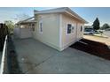 Charming single-story home with a well-maintained exterior and neat landscaping at 9036 Mandel St, Denver, CO 80260