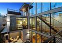 Interior view features an open staircase, multi-level balconies, and modern design at 2539 E 5Th Ave, Denver, CO 80206