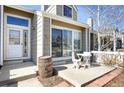 Charming home with cozy front patio, perfect for enjoying outdoor relaxation and neighborhood views at 162 Blue Spruce Ct, Highlands Ranch, CO 80126