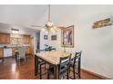 Dining area featuring a ceiling fan and views into the kitchen at 2517 E Egbert St, Brighton, CO 80601