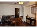 Dining area featuring a wood table, hardwood floors, and built-in cabinets at 2356 S Franklin St, Denver, CO 80210