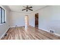 Bright living room with hardwood floors at 1289 Newark St, Aurora, CO 80010