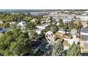 Aerial view showing home's location in a residential neighborhood with mountain views at 2619 S Bannock St, Denver, CO 80223