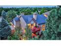 House with a deck and backyard, offering a bird's eye perspective at 3351 Oak St, Wheat Ridge, CO 80033