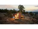 Inviting home with modern design, exterior deck, and abundant natural light at 18645 Rocky Top Trl, Littleton, CO 80127