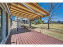 Outdoor deck with retractable awning provides the perfect space for relaxing and entertaining at 2446 S Vaughn Way # A, Aurora, CO 80014