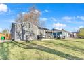 Lovely single-story home with an inviting front porch and spacious lawn area at 3270 S Galapago St, Englewood, CO 80110