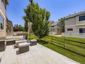 Spacious backyard patio, perfect for outdoor entertaining, with comfortable seating and a fire pit at 3508 E 140Th Pl, Thornton, CO 80602