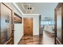 Elegant entryway with a view of the living area, showcasing the bright, open layout of unit 1901 at 1551 Larimer St # 1901, Denver, CO 80202