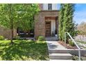 Charming front entrance with a modern door and well-manicured lawn at 501 S Race St, Denver, CO 80209