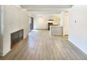 Spacious living room showcasing flooring, open floorplan, and natural light at 2401 S Gaylord St # 206, Denver, CO 80210
