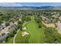 Beautiful aerial view overlooking the golf course and surrounding neighborhood at 7081 Salvia St, Arvada, CO 80007