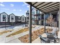 Townhome community boasts modern architecture and landscaped walkways at 12387 W 51St Ave, Wheat Ridge, CO 80033