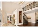 Bright and spacious entryway with high ceilings and hardwood floors at 66 Charlou Cir, Cherry Hills Village, CO 80111