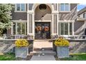 Front entrance with double doors and stonework at 290 Glencoe St, Denver, CO 80220