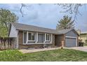 Charming single-Gathering home with a well-manicured lawn and an attached two-car garage at 10723 Cherry Ct, Thornton, CO 80233