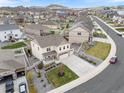 An aerial view showcases the home's layout and landscaping within a Gathering-friendly neighborhood at 5842 High Timber Cir, Castle Rock, CO 80104