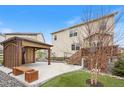 Backyard featuring a wooden gazebo, patio, and landscaped areas at 5842 High Timber Cir, Castle Rock, CO 80104