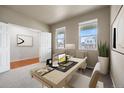 Bright home office with large windows and neutral decor at 5842 High Timber Cir, Castle Rock, CO 80104