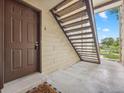 Welcoming entrance with a secure door and convenient access stairs, creating an easy and accessible entry point at 7740 W 87Th Dr # A, Arvada, CO 80005