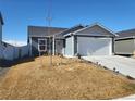 House exterior showcasing a two-car garage and front yard at 429 Beckwourth Ave, Fort Lupton, CO 80621