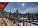 Deck overlooking mountain landscape at 4969 S Indian Trl, Evergreen, CO 80439