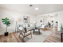 Inviting living room with modern furniture, stylish decor, and ample natural light at 932 Quentin St, Aurora, CO 80011