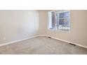 Simple bedroom with neutral wall and carpet at 9637 Browns Peak Cir, Littleton, CO 80125
