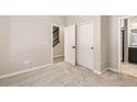 Bedroom with closet and access to hallway and bathroom at 9637 Browns Peak Cir, Littleton, CO 80125